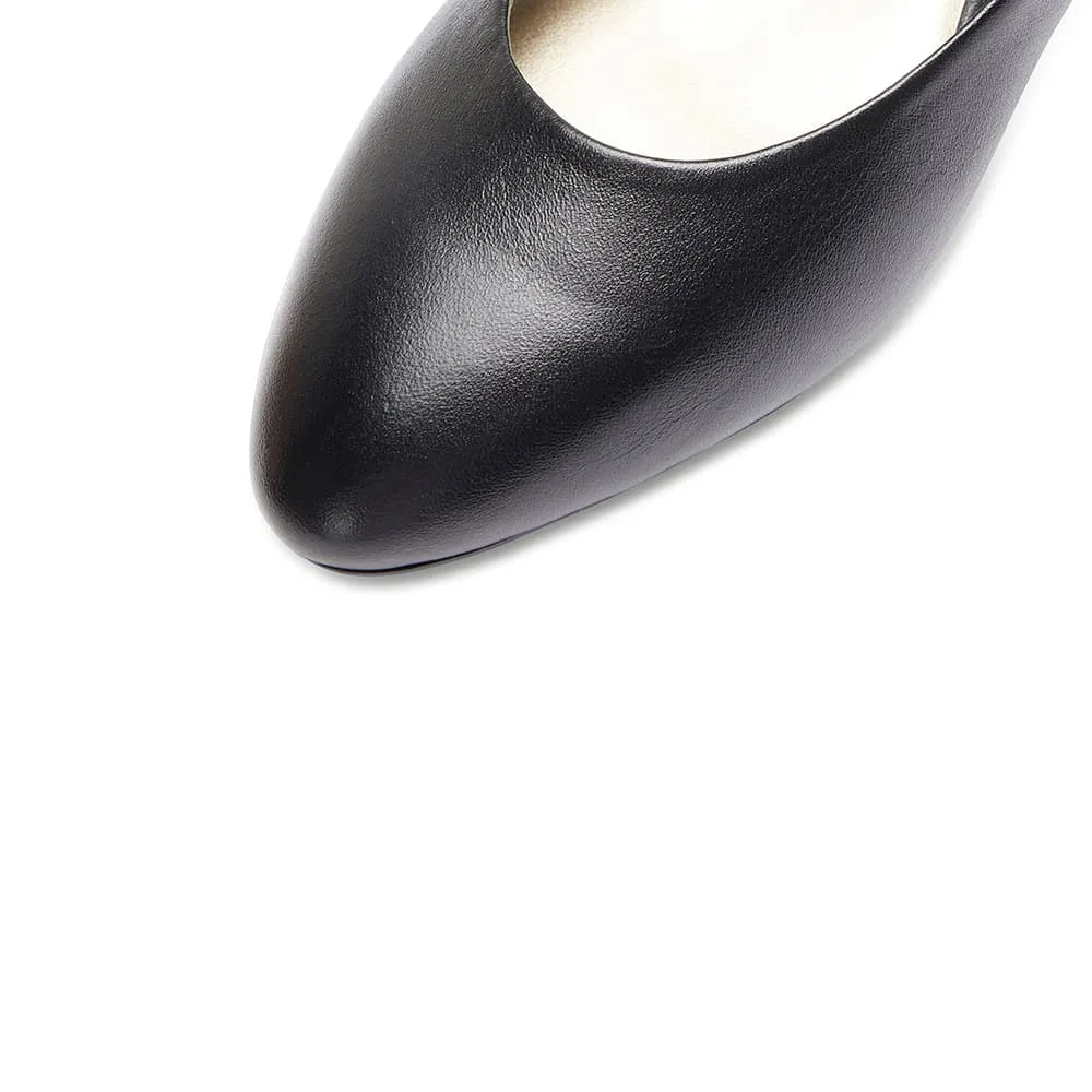 Colette Heel in Black Leather