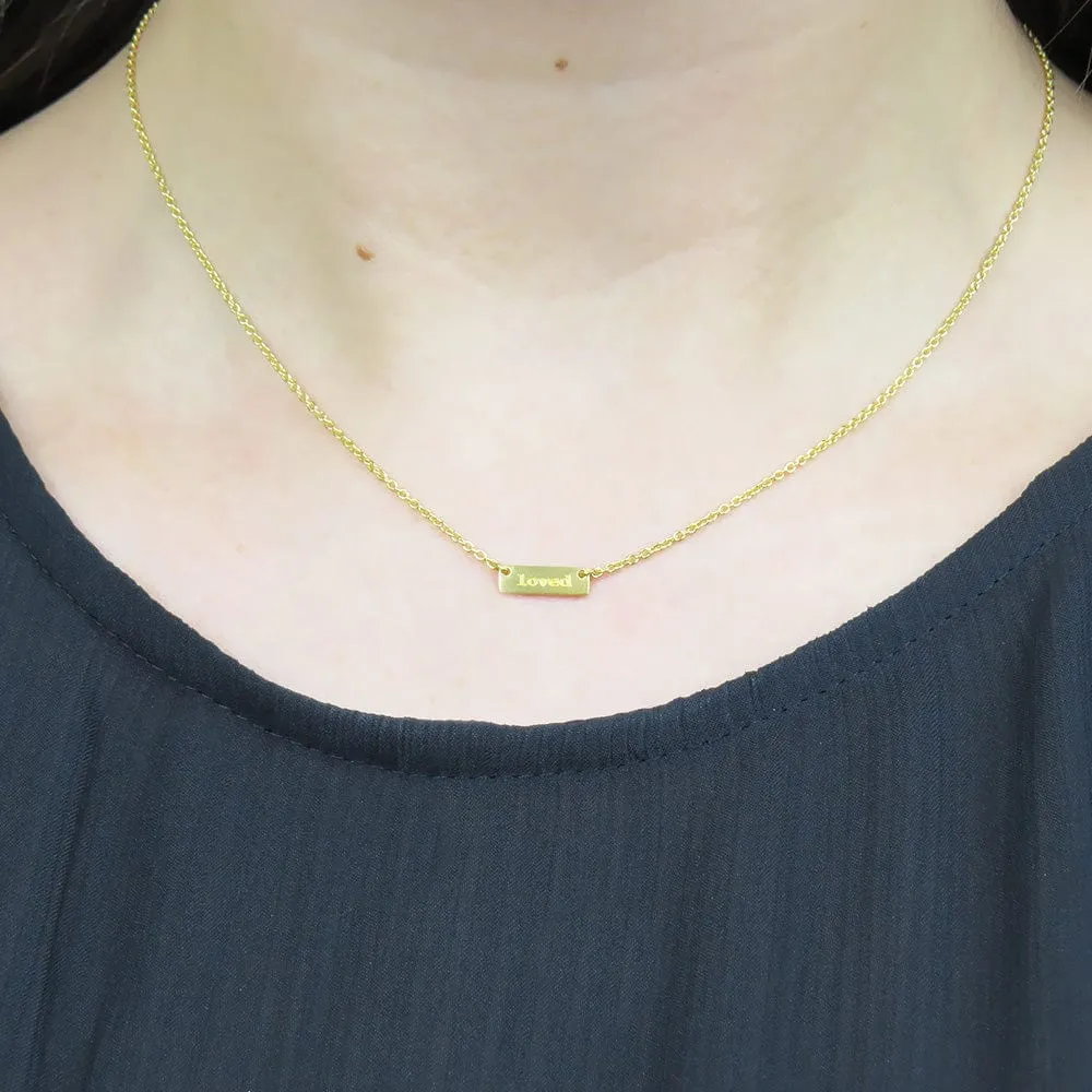 "LOVED" TINY PLATE BRUSHED GOLD NECKLACE